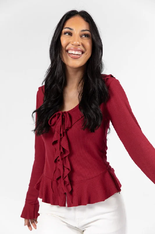 women's tops for those who want to add a pop of color to their outfitsTreat You The Same Wine Ruffle Detail Ribbed Blouse